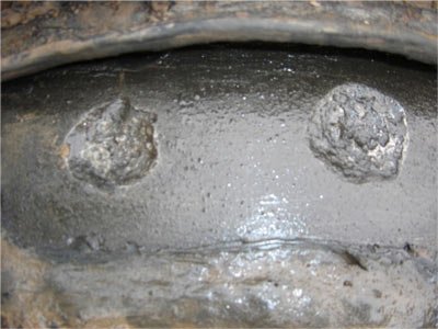 AC-Induced Corrosion